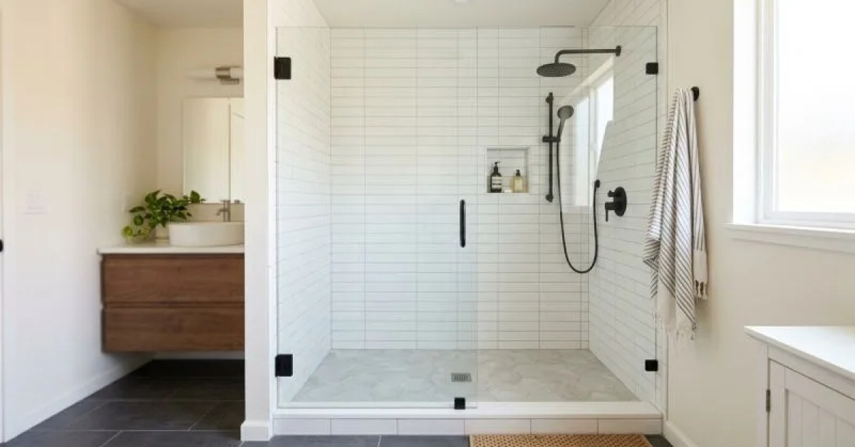 Bathroom with a converted shower area, accessible entry, and wall storage